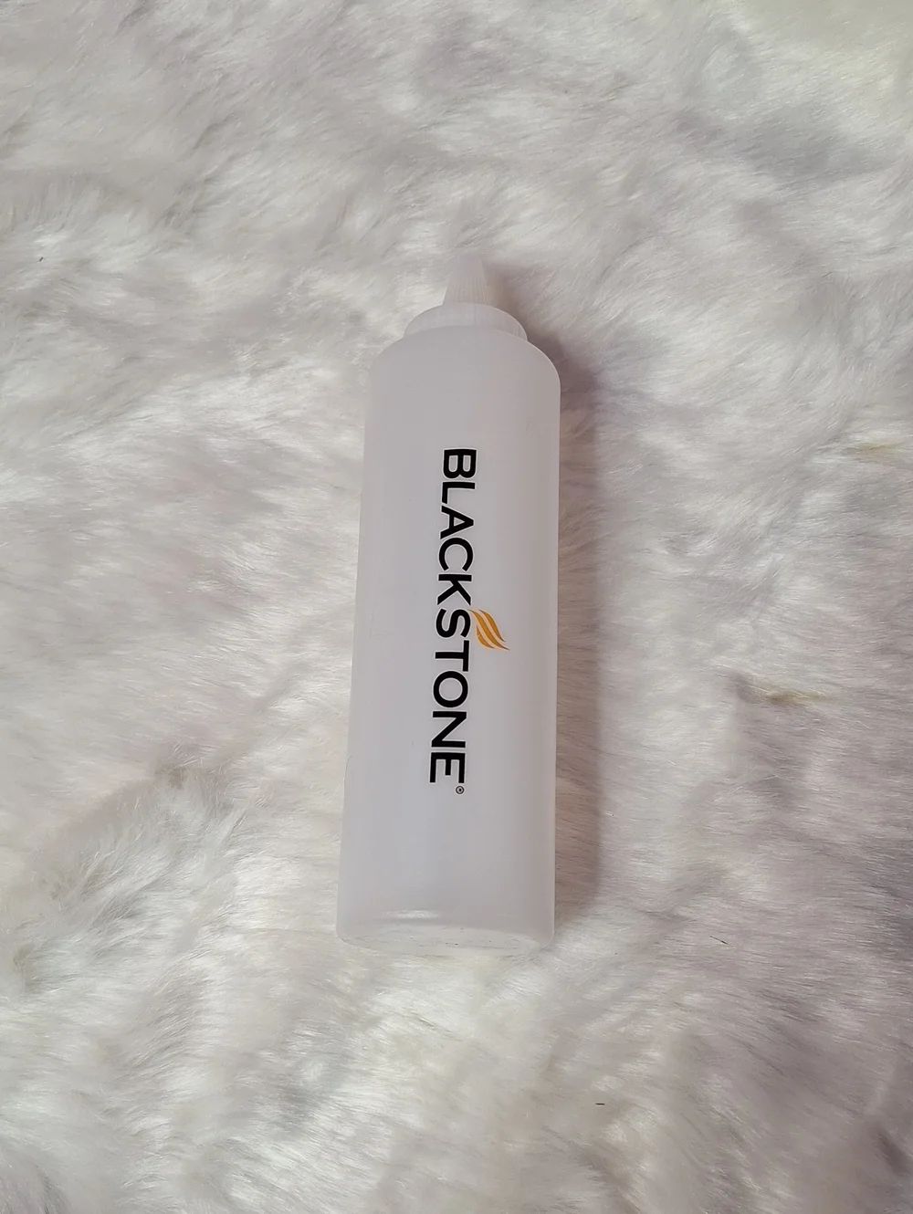 Blackstone Frosted White Oil Plastic Squeeze Bottle with Gold Logo